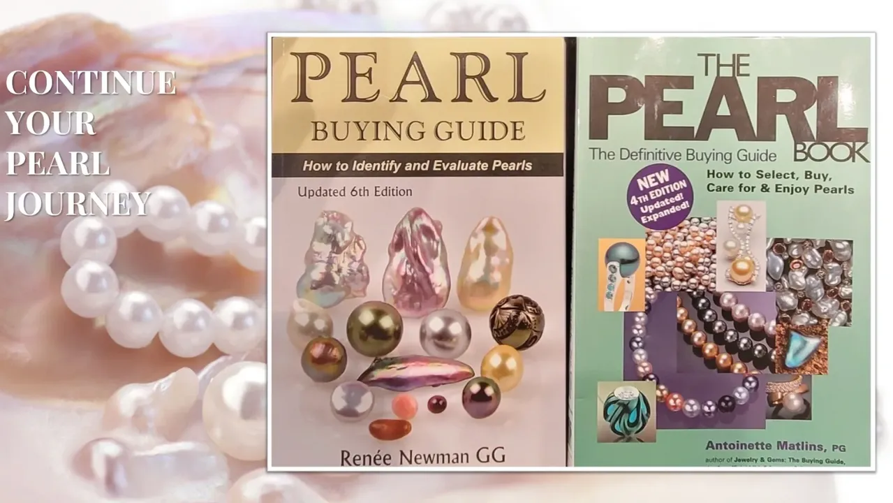 Two books about pearls titled "pearl buying guide" and "the pearl book" displayed alongside strands of various pearls.